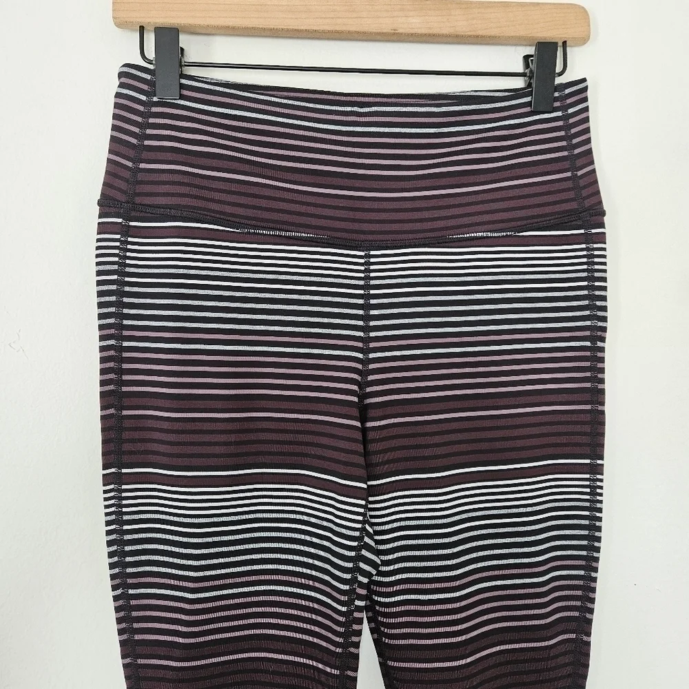 Athleta purple stripe expanse chaturangs leggins size M